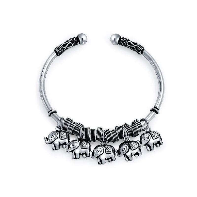 Ladies bracelets tension set styles-Bali Style Elephant Bangle Bracelet with 5 Charms in Antiqued Sterling Silver