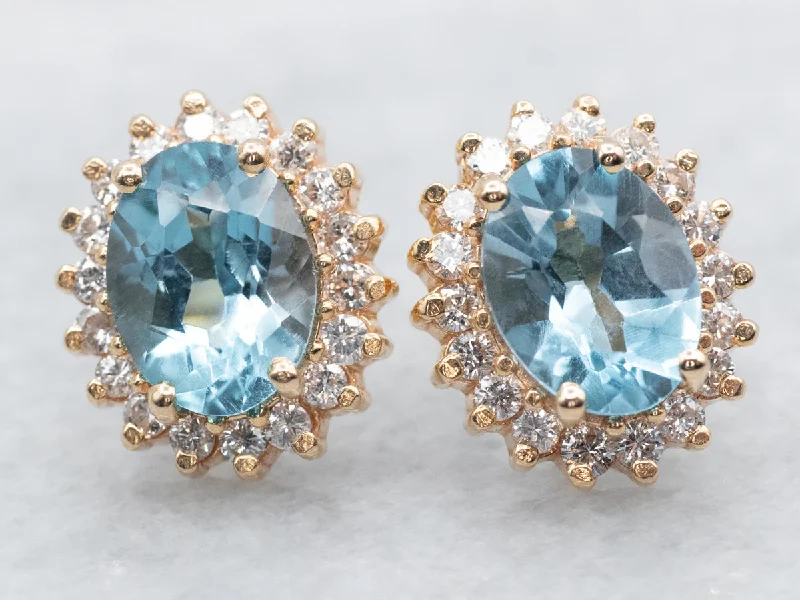 Ladies earrings cultural celebration styles-Blue Topaz Stud Earrings with Diamond Halo