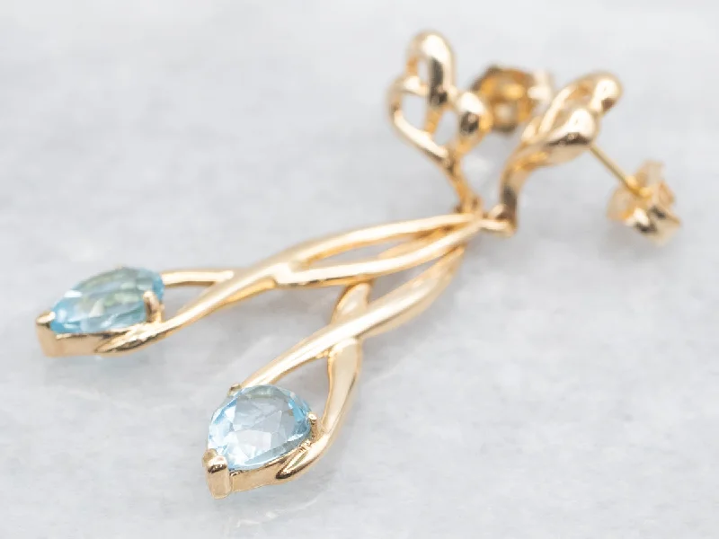 Ladies earrings topaz vibrant designs-Twisting Gold Blue Topaz Drop Earrings