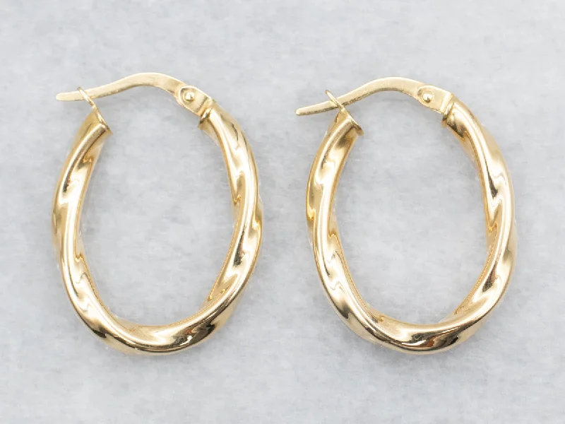 Ladies earrings monochromatic styles-Oval Gold Twist Hoop Earrings