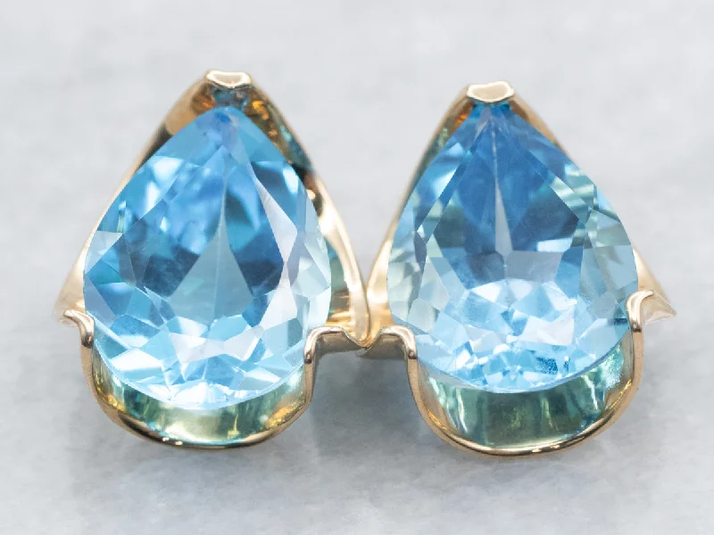 Ladies earrings diamond accent pieces-Teardrop Blue Topaz Stud Earrings