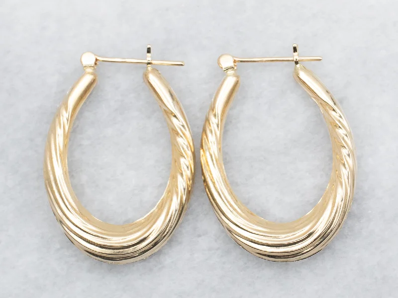 Ladies earrings cute playful accents-Hollow Oval Twist Hoop Earrings