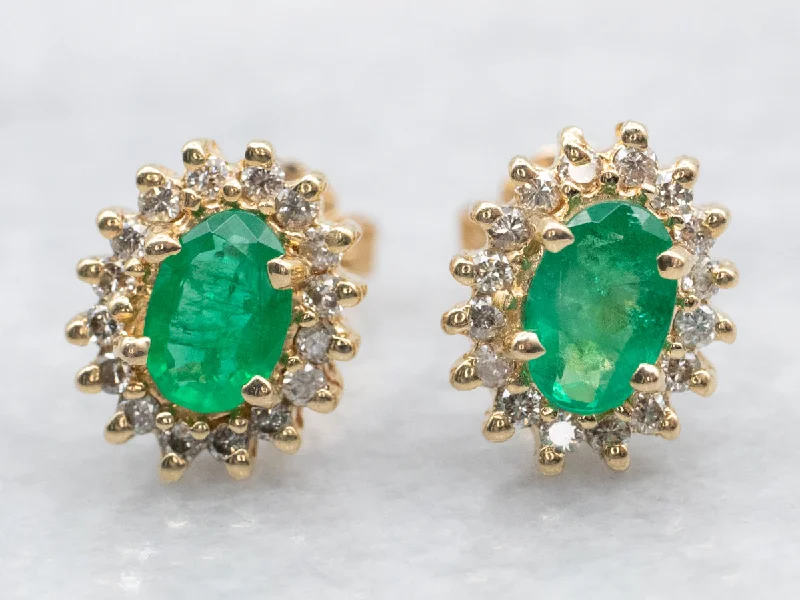 Ladies earrings signature piece designs-Emerald and Diamond Halo Stud Earrings