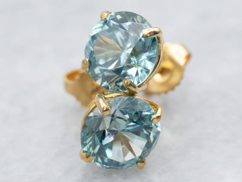 Ladies earrings size selection guide-Yellow Gold Round Cut Blue Zircon Stud Earrings