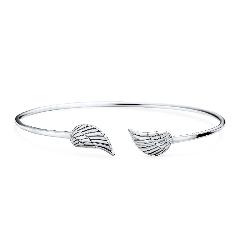 Ladies bracelets pride-inspired bracelets-Dainty Guardian Angel Wing Feather Cuff Bracelet in Sterling Silver